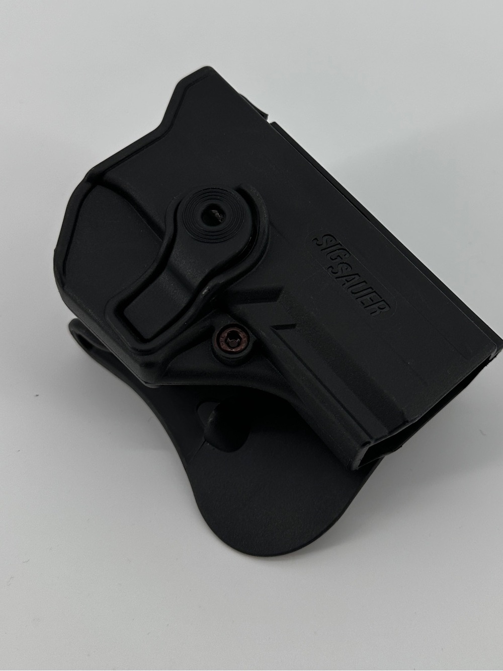 Sig Sauer P250-P320 .45 ACP paddle holster, with trigger guard lock.
